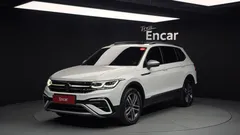 2023 Volkswagen Tiguan 2.0 TSI Prestige, белый — фото 1