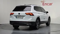 2023 Volkswagen Tiguan 2.0 TSI Prestige, белый — фото 2