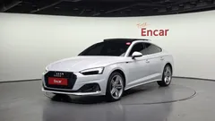 2023 Audi A5 40 TFSI Quattro Sportback, белый — фото 1