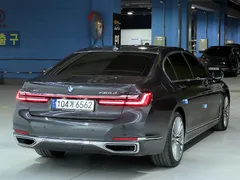 2022 BMW 7-Series 730Ld xDrive Design Pure Excellence, серый — фото 4