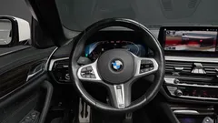 2021 BMW 5-Series 520i M Sport, белый — фото 13