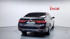 2022 BMW 7-Series 730d xDrive Design Pure Excellence, серый — фото 4