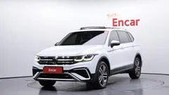 2023 Volkswagen Tiguan 2.0 TSI Prestige, белый — фото 1