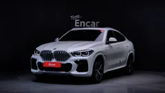 2023 BMW X6 xDrive40i M Sport, белый — фото 1