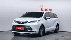 2023 Toyota Sienna 2.5 Hybrid AWD, белый — фото 1