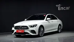 2021 Mercedes-Benz E-Class E350 4MATIC AMG Line, белый — фото 1