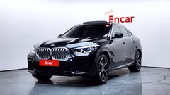 2022 BMW X6 xDrive40i M Sport, чёрный — фото 1
