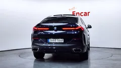 2022 BMW X6 xDrive40i M Sport, чёрный — фото 4