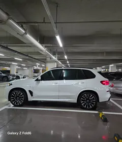 2024 BMW X5 xDrive 50e M Sport — фото 14