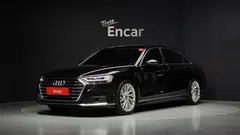 2021 Audi A8 55 TFSI Quattro LWB, чёрный — фото 1