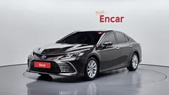 2022 Toyota Camry 2.5 LE Hybrid, 연금색 — фото 1