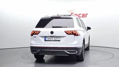2023 Volkswagen Tiguan 2.0 TSI Prestige, белый — фото 4