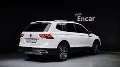 2023 Volkswagen Tiguan 2.0 TSI Prestige, белый — фото 2