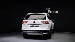 2023 Volkswagen Tiguan 2.0 TSI Prestige, белый — фото 4