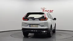 2022 Honda CR-V 2.0 Hybrid Touring 4WD, белый — фото 4