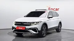 2023 Volkswagen Tiguan 2.0 TSI Prestige, белый — фото 1