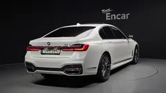 2022 BMW 7-Series 740i M Sport, белый — фото 2