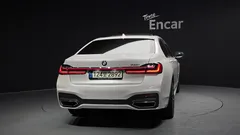 2022 BMW 7-Series 740i M Sport, белый — фото 4