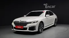 2022 BMW 7-Series 740i M Sport, белый — фото 11