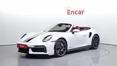 2021 Porsche 911 Turbo S Cabriolet, белый — фото 1