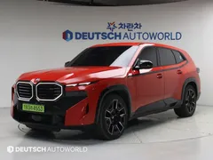 2023 BMW XM 4.4, оранжевый — фото 11