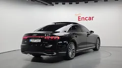 2023 Audi A8 55 TFSI Quattro Premium LWB, чёрный — фото 2