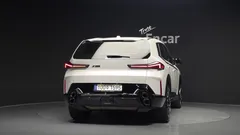 2023 BMW XM 4.4, белый — фото 4