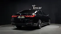 2021 BMW 7-Series 730d xDrive M Sport, чёрный — фото 2
