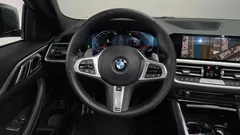 2022 BMW 4-Series 420i M Sport Performance Coupe, зелёный — фото 13