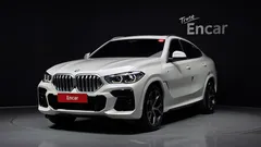 2022 BMW X6 xDrive40i M Sport, белый — фото 1