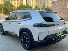 2023 BMW XM 4.4, белый — фото 3