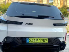 2023 BMW XM 4.4, белый — фото 5