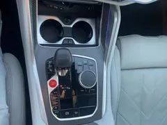 2023 BMW XM 4.4, белый — фото 17