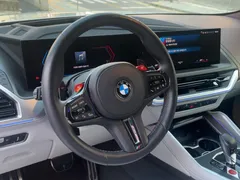 2023 BMW XM 4.4, белый — фото 19