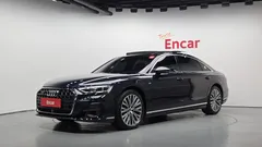 2023 Audi A8 55 TFSI Quattro Premium LWB, синий — фото 1