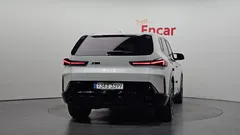 2023 BMW XM 4.4, белый — фото 4
