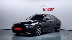 2021 BMW 3-Series 320i M Sport, чёрный — фото 1