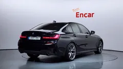 2021 BMW 3-Series 320i M Sport, чёрный — фото 2