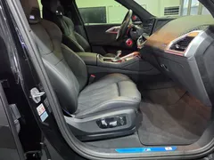 2023 BMW XM 4.4, чёрный — фото 10