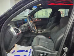 2023 BMW XM 4.4, чёрный — фото 16