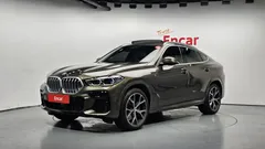 2023 BMW X6 xDrive40i M Sport, 연금색 — фото 1