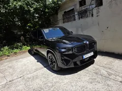 2023 BMW XM 4.4, чёрный — фото 1