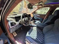 2023 BMW XM 4.4, чёрный — фото 7
