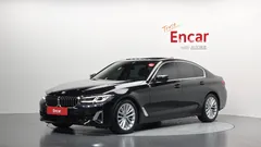 2023 BMW 5-Series 520i Luxury, чёрный — фото 1