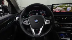 2023 BMW 5-Series 520i Luxury, чёрный — фото 14