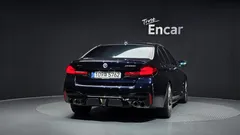 2023 BMW 5-Series M550i xDrive — фото 4