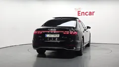 2023 Audi A8 55 TFSI Quattro Premium LWB, чёрный — фото 4