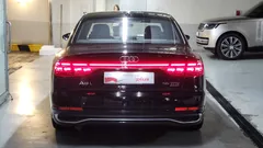 2023 Audi A8 55 TFSI Quattro Premium LWB, чёрный — фото 4