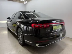 2023 Audi A8 55 TFSI Quattro Premium LWB, чёрный — фото 4