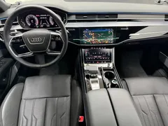 2023 Audi A8 55 TFSI Quattro Premium LWB, чёрный — фото 5